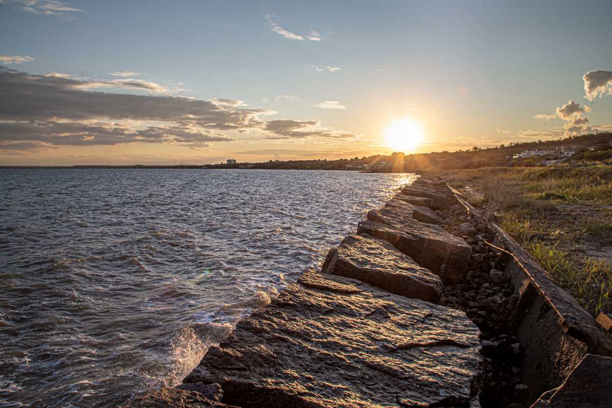 Beautiful sea at sunset near the rocky shore